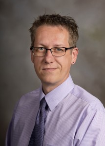 Formal headshot of Dr. Brett Shadle